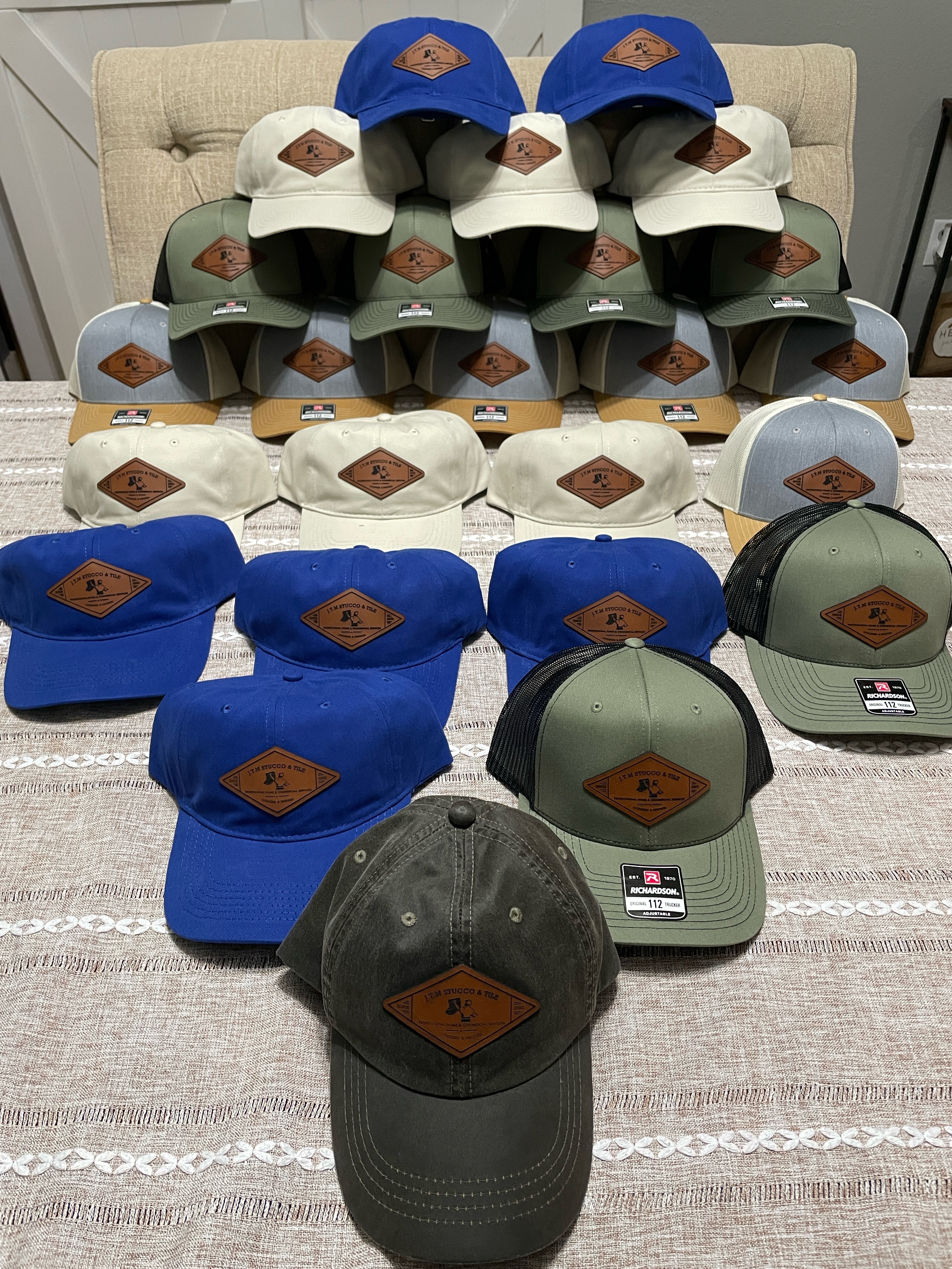 JT&M Stucco & Tile bulk order — multi-color Richardson 112 custom patch hats
